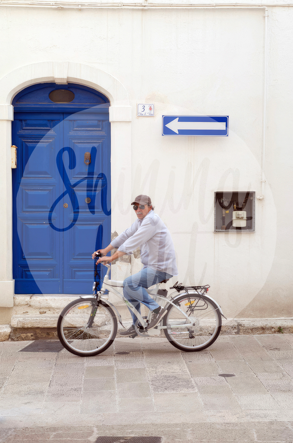 Blue Door Bike Rider - Martina Franca, Puglia Italy